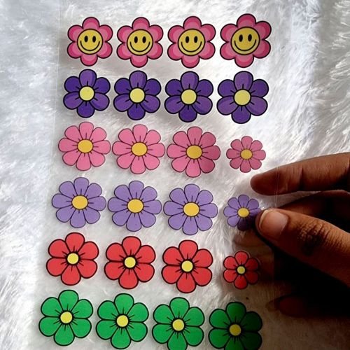 Vibrant Smiley Face Flower UV DTF Stickers hover